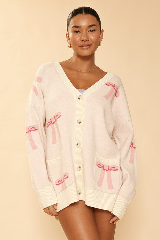 Cream All over bow knit cardigan