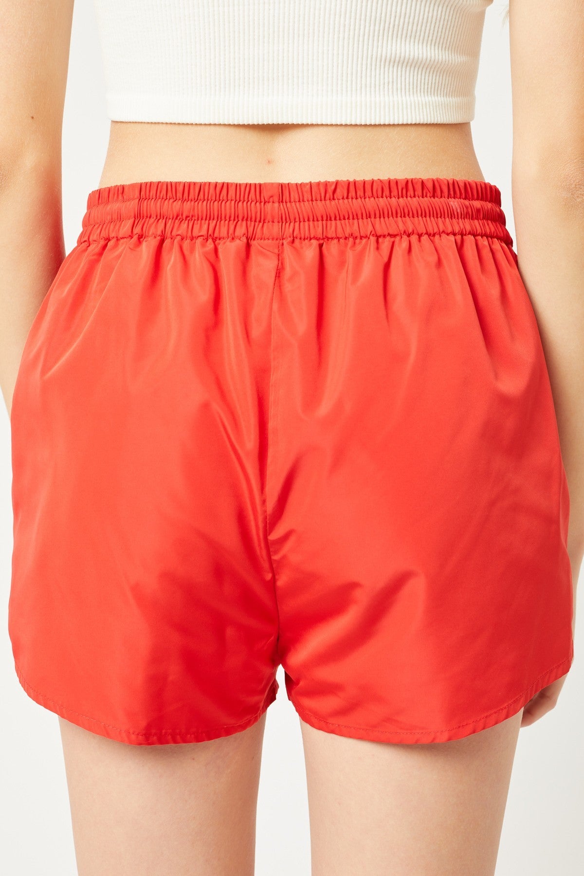 Orange Pair Of Windbreaker Shorts