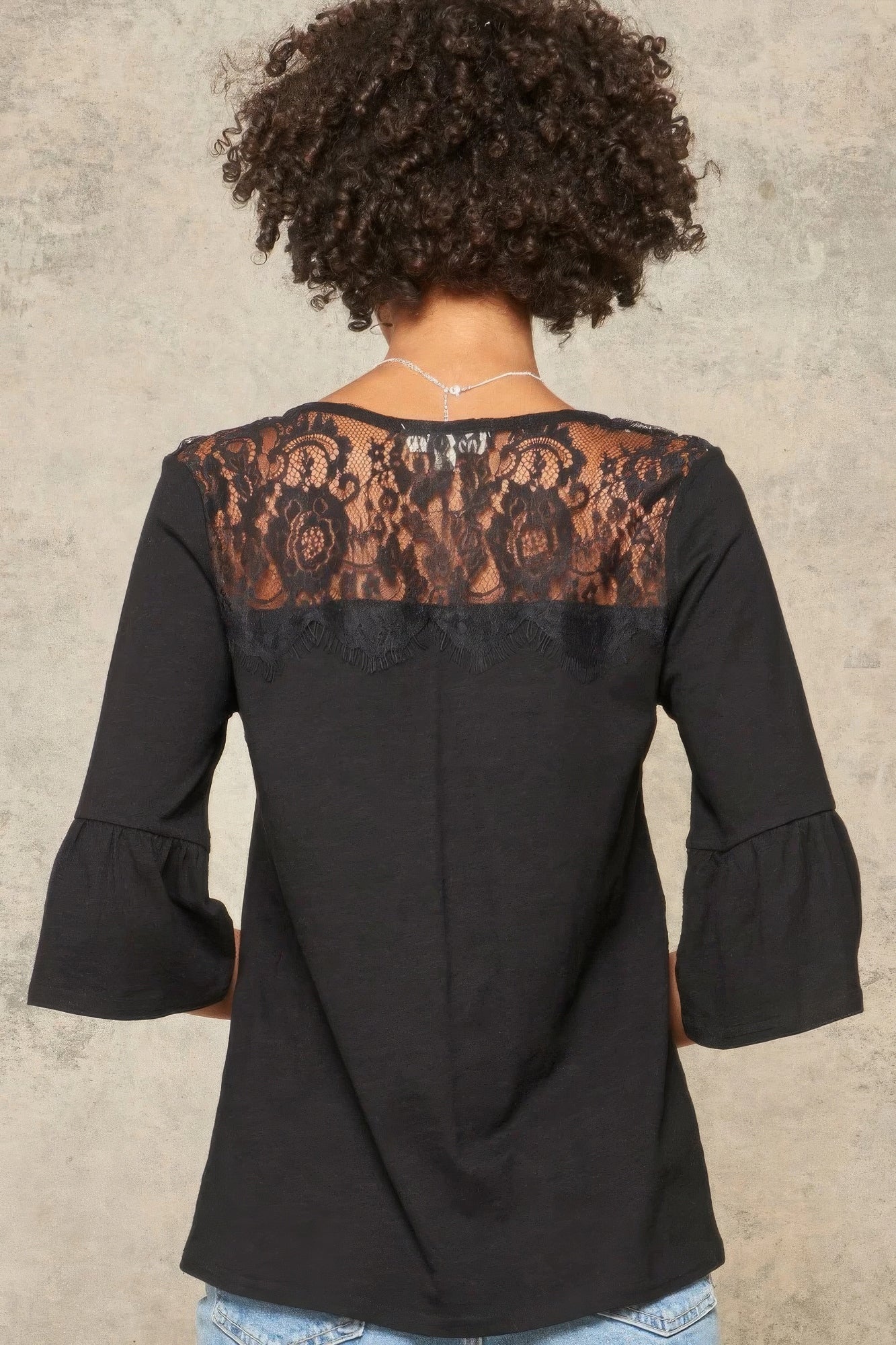 Black Knit Top With Deep V Neckline And Yoke Design